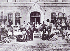Historic photo of people gathered in front of The Berghoff.