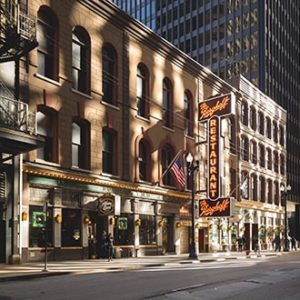 This shows the outside of the Berghoff Restaurant and Adams Street Brewery in Chicago.